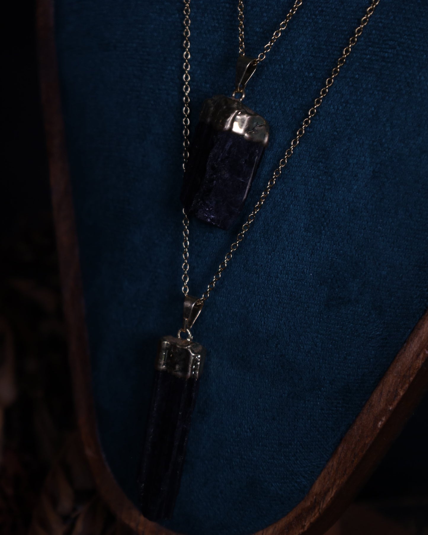 Black tourmaline pendant with gold setting