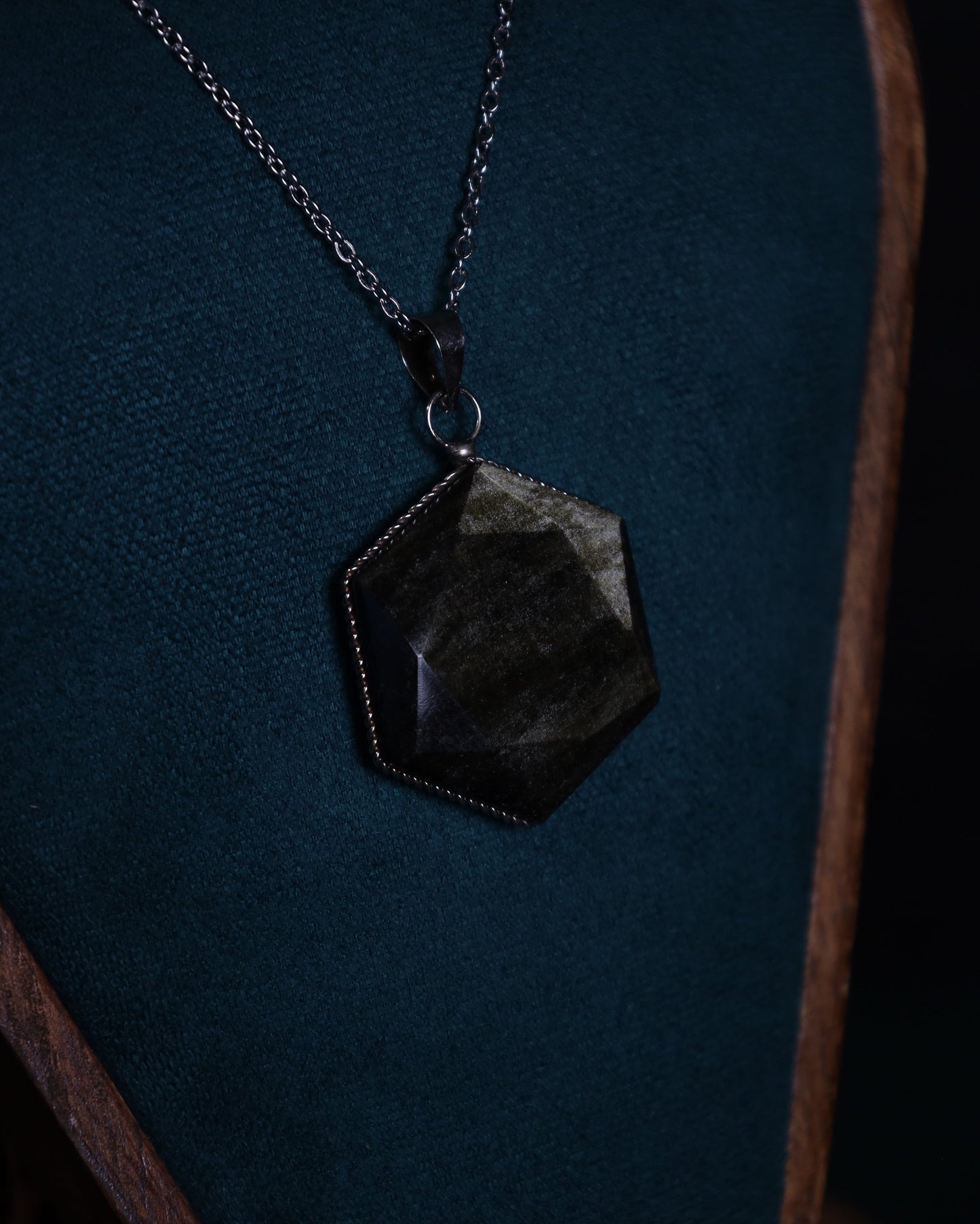 Gold obsidian hexagon pendant with genuine silver setting