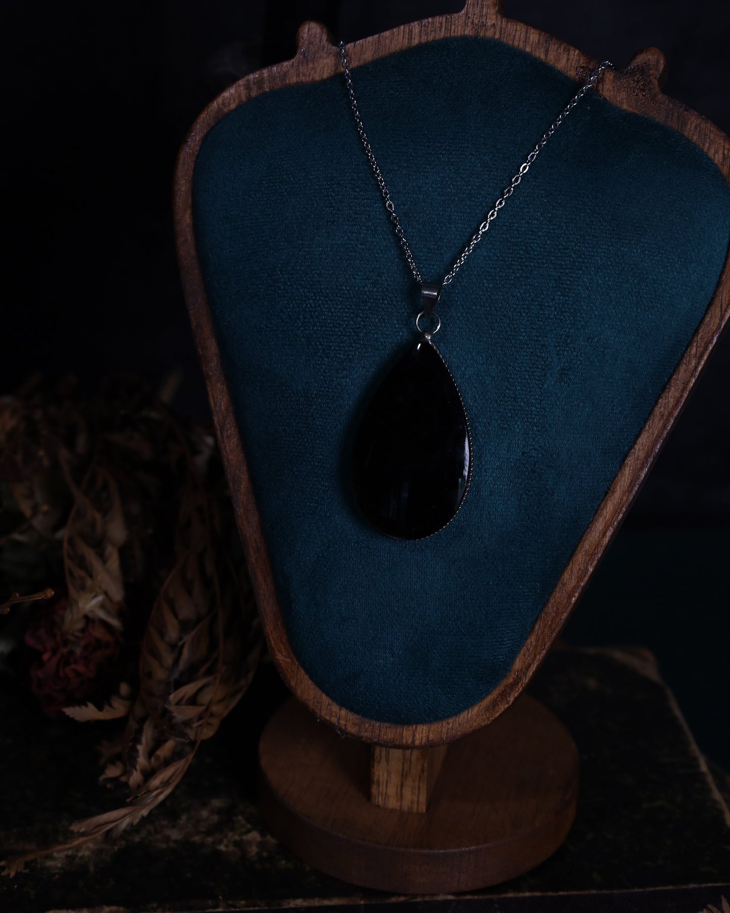 Gold obsidian pendant with genuine silver setting