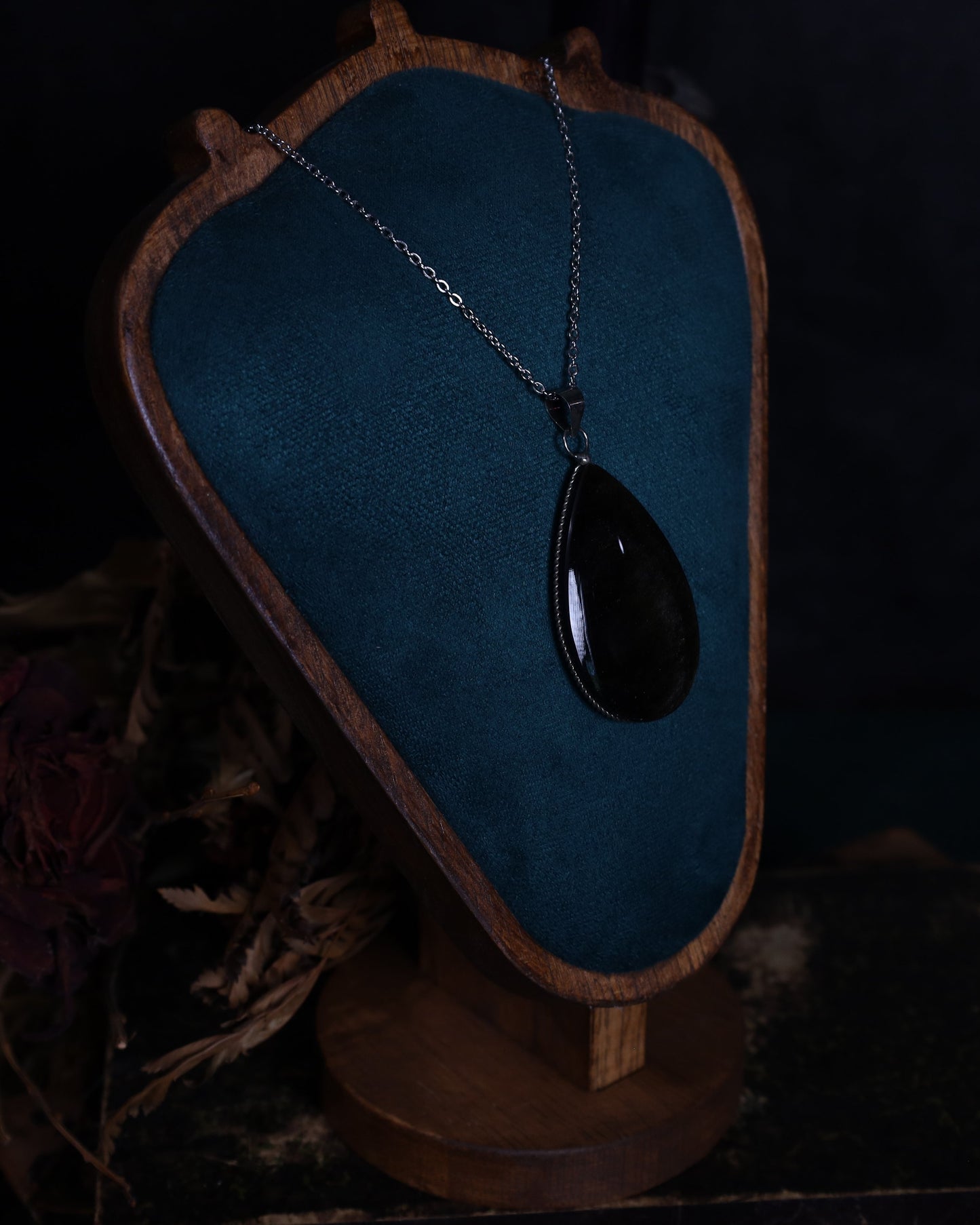 Gold obsidian pendant with genuine silver setting