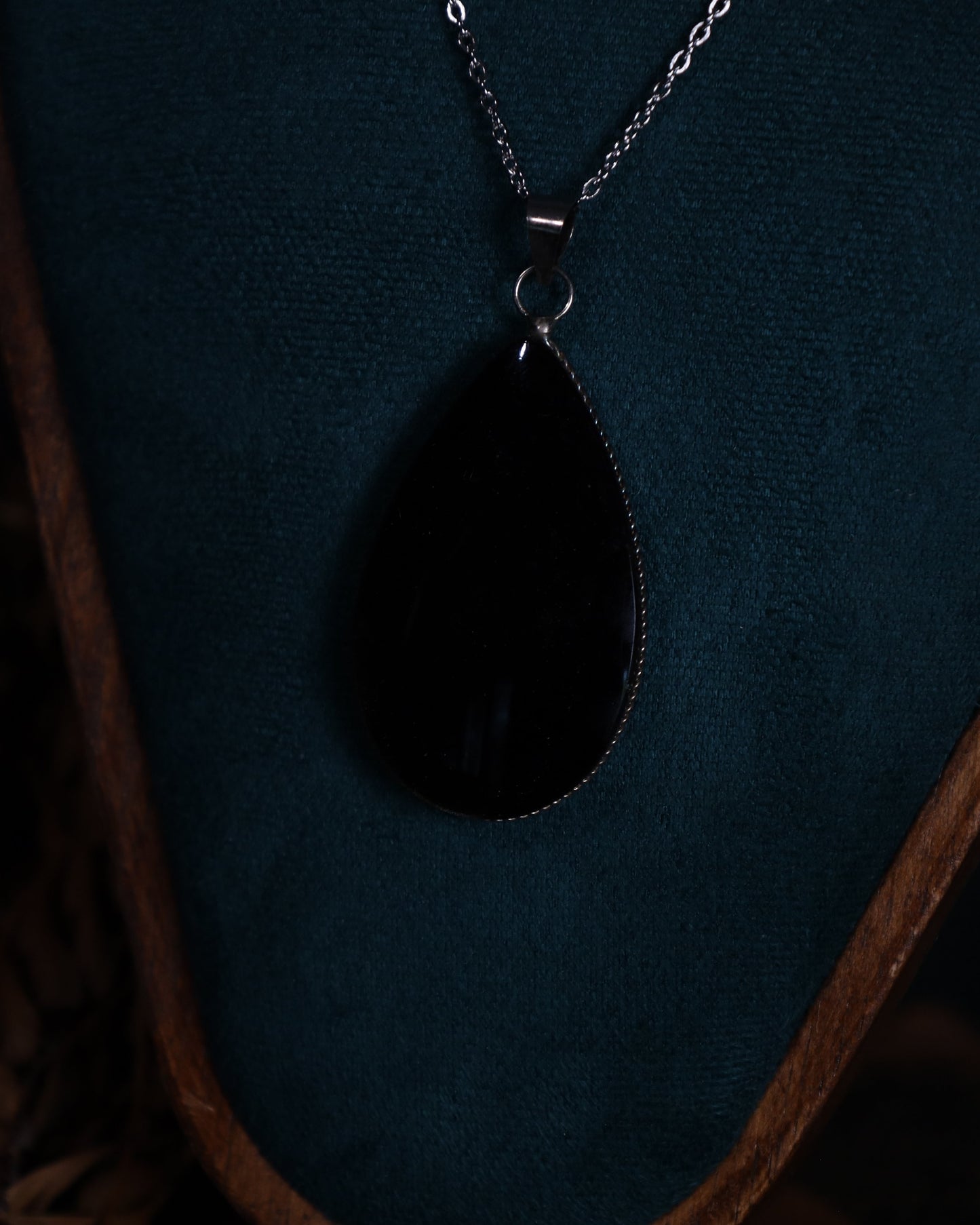 Gold obsidian pendant with genuine silver setting