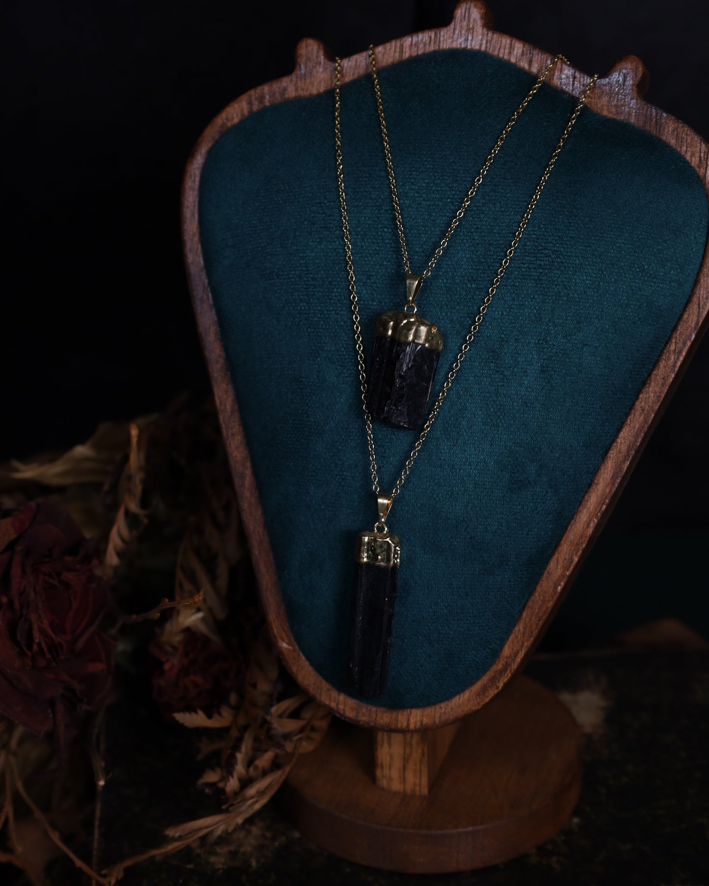 Black tourmaline pendant with gold setting