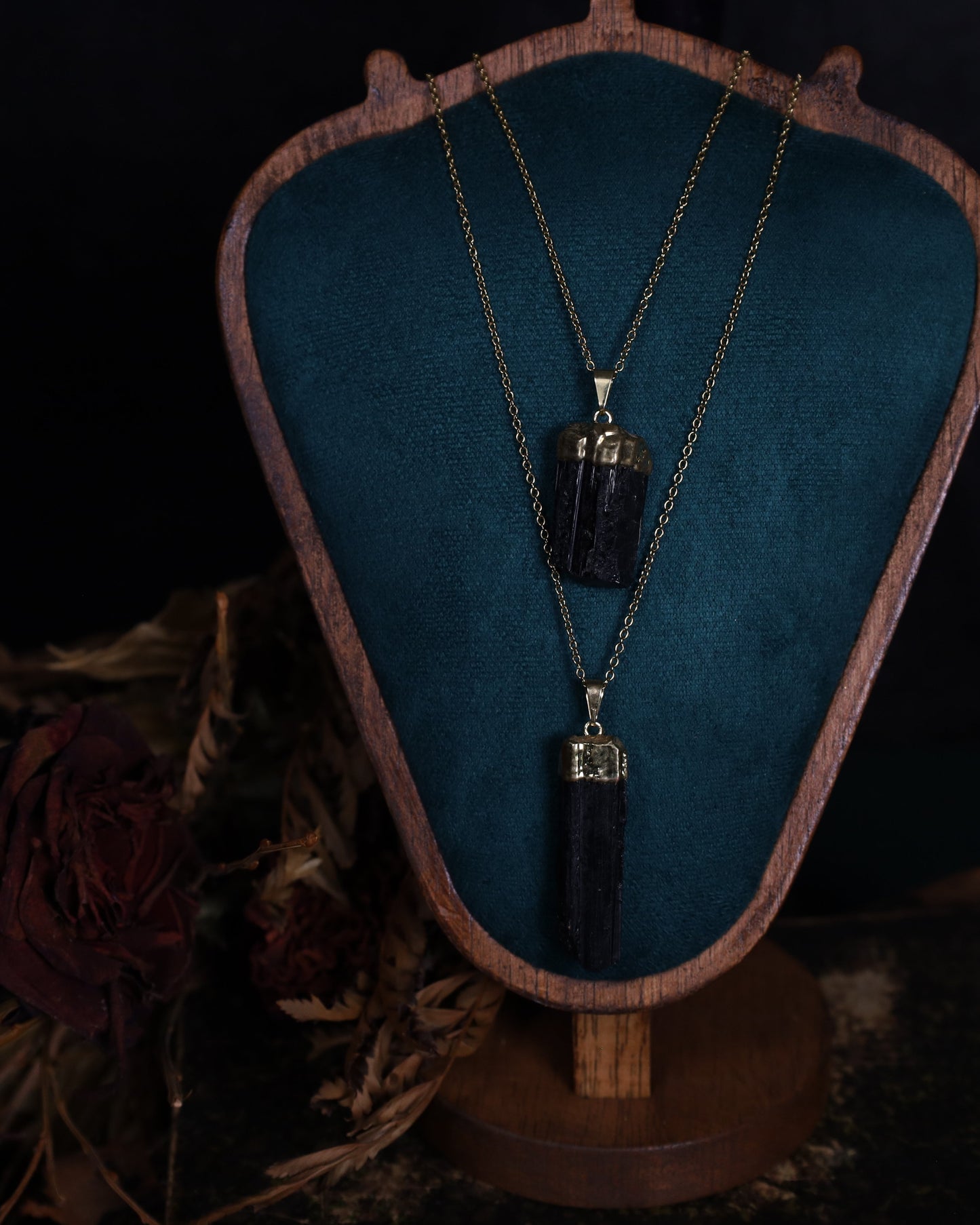 Black tourmaline pendant with gold setting