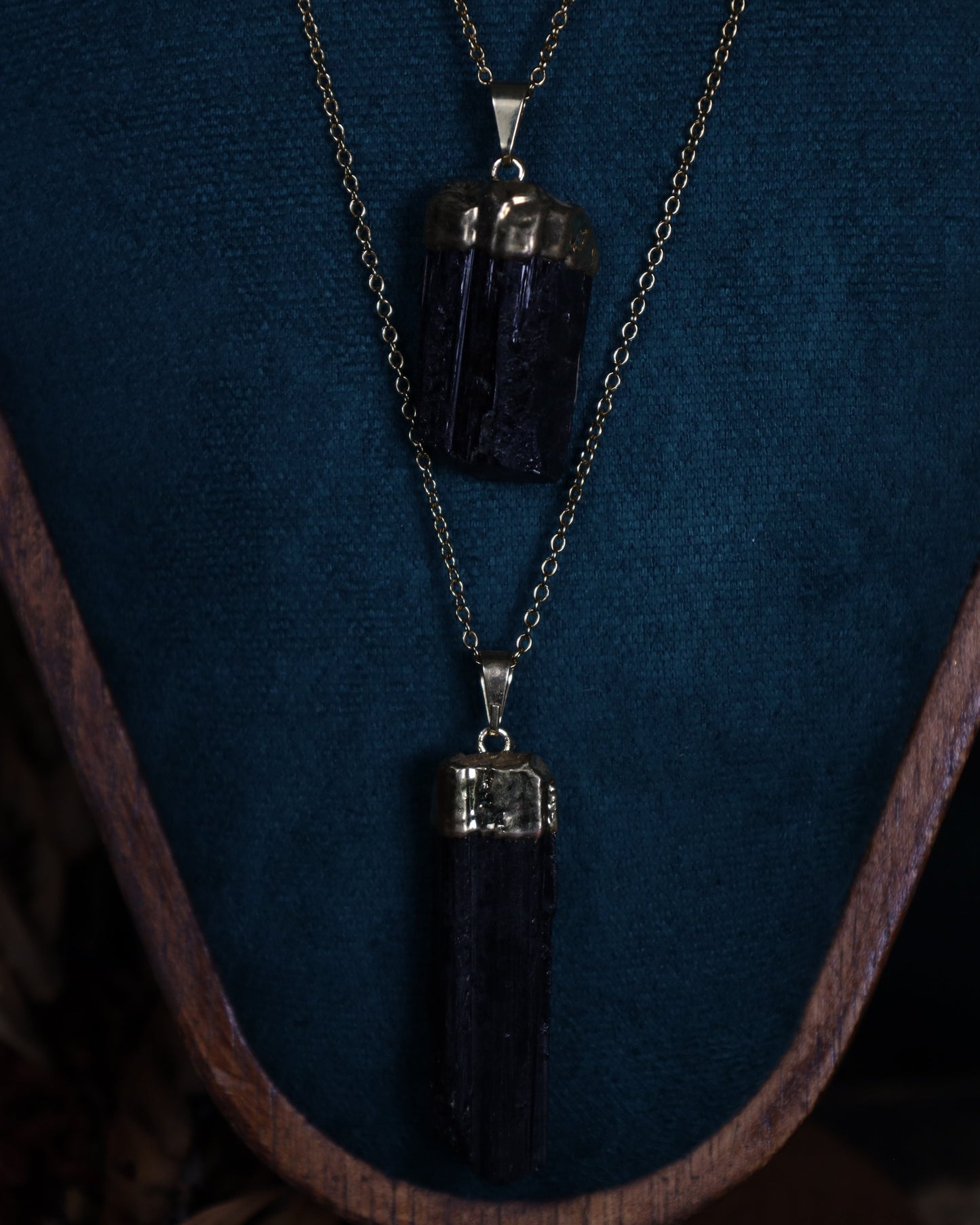 Black tourmaline pendant with gold setting